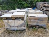 a lot of boxes that have been stacked up on the ground