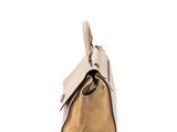 a close up of a handbag on a white surface with a white background