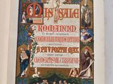 an open book with a picture of jesus on the cross on it