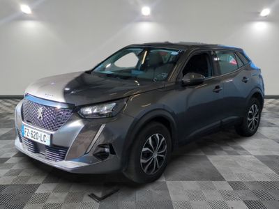 a grey suv parked in a room with a checkered floor