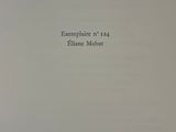 an open book with a black and white title on it