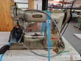 a sewing machine that is sitting on a table