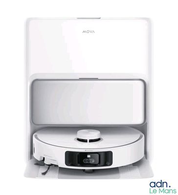 an image of a white roombake with a remote on top of it