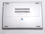 a silver laptop that is sitting on a table