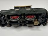 a toy train that is sitting on a white surface