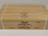 a wooden box that has a label on it