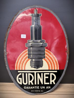 an old metal sign with a red background and a picture of a light bulb