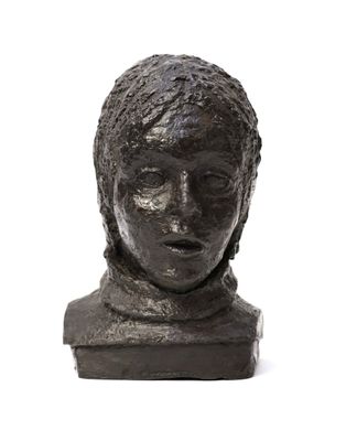 statue of a man with a head of hair on a white background