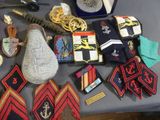 a table with a lot of military items on it