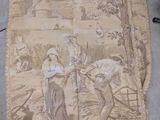 a large piece of fabric with a picture of a man and a woman on it