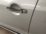 a close up of a door handle on a car