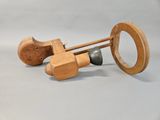 a wooden toy that is sitting on a table