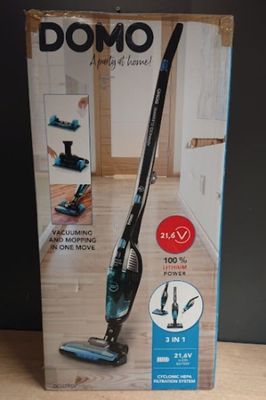 the box of the vacuum is open on the table