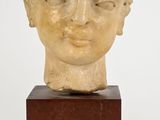 marble head of a young boy on a marble block