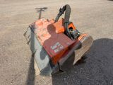 a small machine that is sitting on the ground
