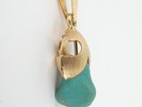gold and turquoise sea glass pendant on a gold plated chain