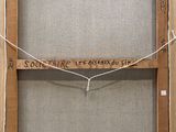 an image of a picture of a wooden frame with writing on it