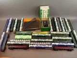 a lot of toy trains that are on the table