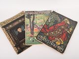 trois livres sur une table blanche sur fond blanc