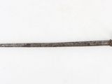 a close up of a knife on a white surface with a white background