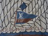 a close up of a towel with a flag on it