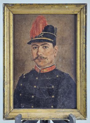 portrait of a man in a military uniform in a gold frame