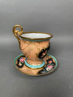 an image of a cup and saucer sitting on a saucer