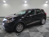 a black suv parked in a room with a checkered floor