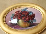 a picture of a painting of roses in a gold vase