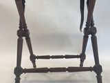 an old wooden table with a drawer on top of it