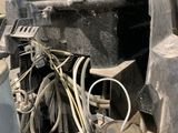 a truck with a bunch of wires on the back of it