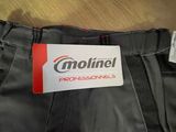 a label on the back of a pair of black pants