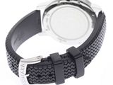 the watch is black and silver with a black strap around it