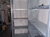 a room with a lot of shelvings in it