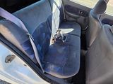 an image of a car that has a seat in the back