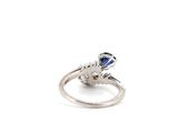 an image of a diamond and sapphire ring on a white background