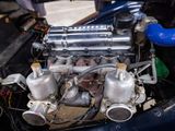 a close up of a small engine in a car