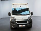 a white van that is parked in a room