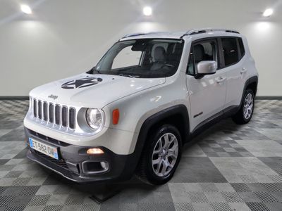 the white jeep is parked on a checkered floor in a room