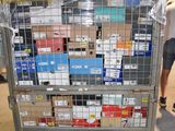 a large cart with many boxes on it in a warehouse