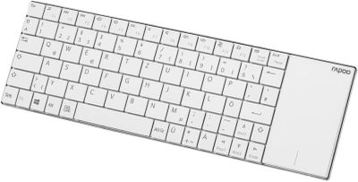 a computer keyboard with a white key board on it