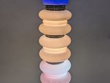 a lamp that has a blue light on top of it