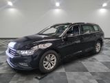 the volkswagen passat is parked on a checkered tile floor