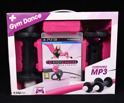 a pink box with a video game and a pair of headphones