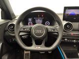 steering wheel of a car with dashboard controls and steering controls