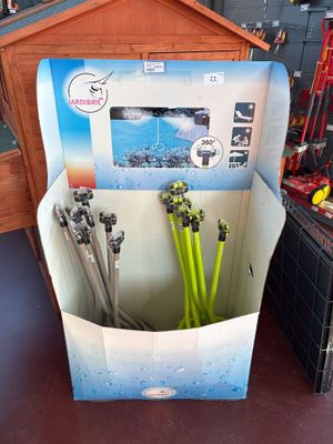 a cardboard box with a bunch of skis inside of it