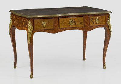 an image of a small table with drawers and a marble top