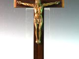 a wooden cross with a crucifix on it
