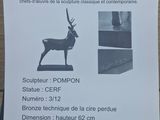 a sign with a picture of an antelope on it