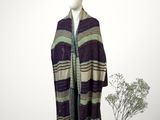 an image of a mannequin dressed in a hat and scarf